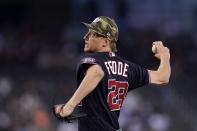 Washington Nationals starting pitcher Erick Fedde throws a pitch against the Arizona Diamondbacks during the first inning of a baseball game Sunday, May 16, 2021, in Phoenix. (AP Photo/Ross D. Franklin)