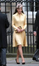 <p>For a ceremony in Scotland, the Duchess donned a bespoke yellow look by Emilia Wickstead. She paired the look with a cappuccino Whiteley hat and matching brown shoes and clutch from Emmy London.</p><p><i>[Photo: PA]</i></p>