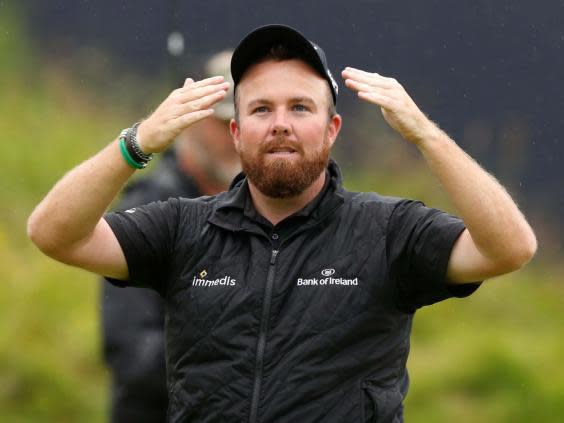 Shane Lowry soaks up the celebrations on the 18th after winning The Open (Reuters)