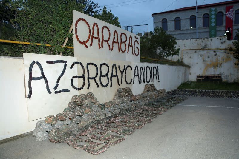 Azerbaijani military show weapons seized from Karabakh Armenians