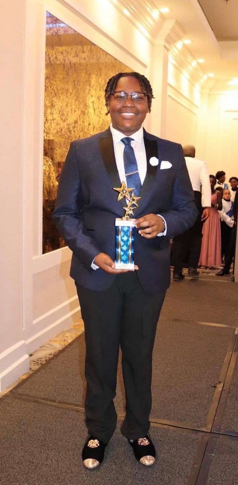 Dajeun Dickerson received the Macy Gray Rising Star Award from the EN-RICH-MENT Fine Arts Academy in Canton for his talents as a vocalist.