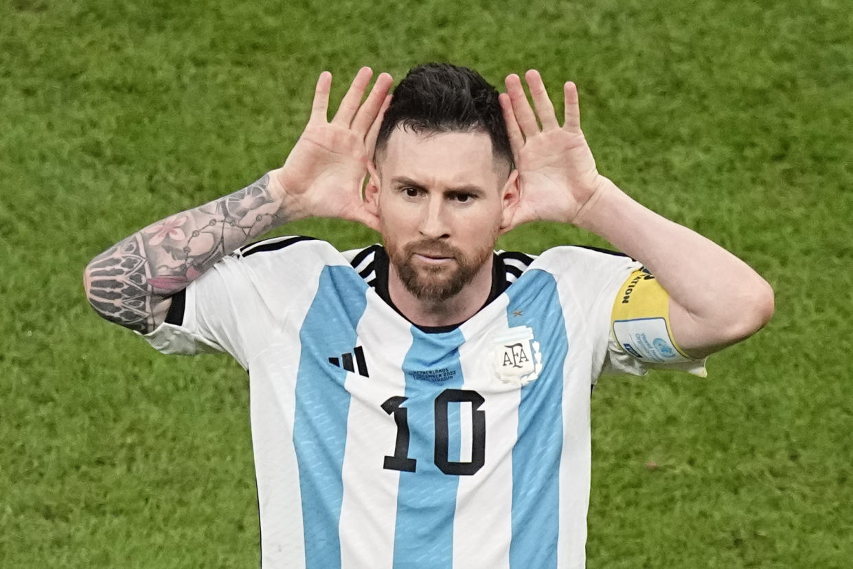 Argentina's Lionel Messi celebrates after scoring during a World Cup quarterfinal match against Netherlands, at the Lusail Stadium in Lusail, Qatar, Friday, Dec. 9, 2022. (AP Photo/Ariel Schalit)