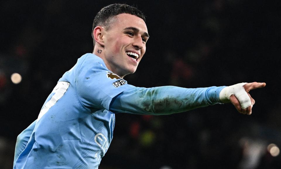 <span><a class="link " href="https://sports.yahoo.com/soccer/players/937742/" data-i13n="sec:content-canvas;subsec:anchor_text;elm:context_link" data-ylk="slk:Phil Foden;sec:content-canvas;subsec:anchor_text;elm:context_link;itc:0">Phil Foden</a> celebrates the second of his three goals against <a class="link " href="https://sports.yahoo.com/soccer/teams/aston-villa/" data-i13n="sec:content-canvas;subsec:anchor_text;elm:context_link" data-ylk="slk:Aston Villa;sec:content-canvas;subsec:anchor_text;elm:context_link;itc:0">Aston Villa</a>. </span><span>Photograph: Paul Ellis/AFP/Getty Images</span>