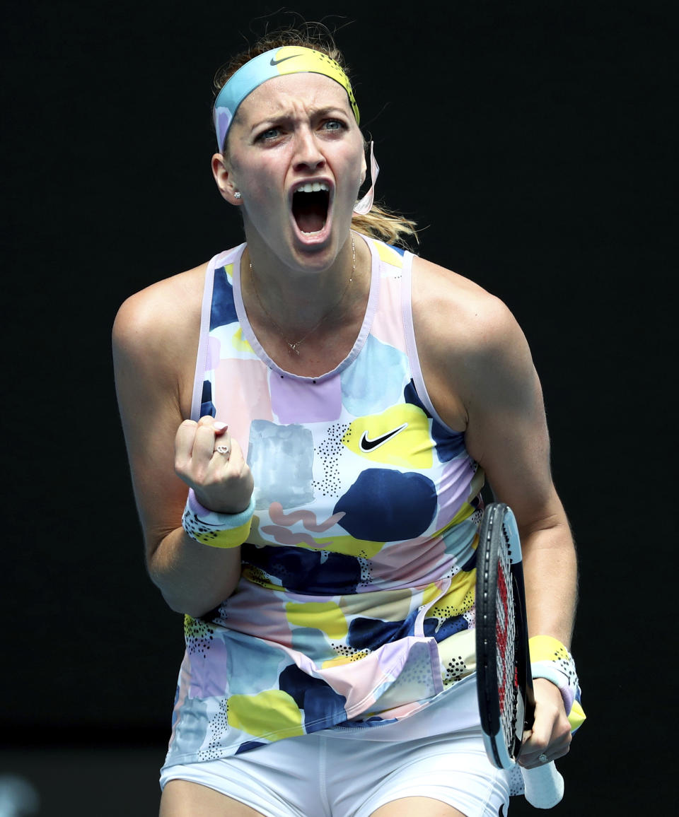 Petra Kvitova of the Czech Republic reacts after winning point against Spain's Paula Badosa in their second round singles match at the Australian Open tennis championship in Melbourne, Australia, Wednesday, Jan. 22, 2020. (AP Photo/Dita Alangkara)