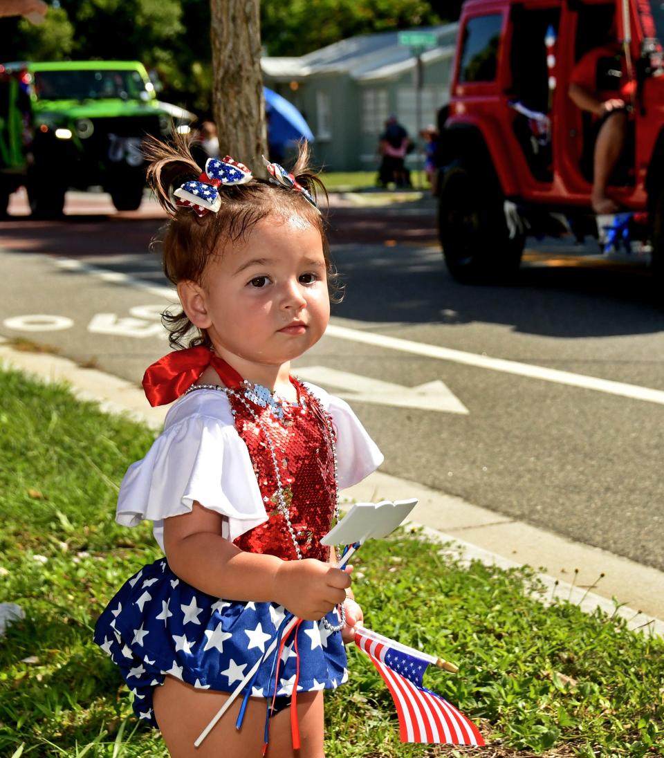 Josie Moon, 17-months-old, got into the patriotic spirit Thursday. The 2024 Fourth of July parade began on Hickory Street, seen here, just after 10 a.m.. The route ended in Historic Downtown Melbourne. The parade was followed by an Independence Day celebration at the Liberty Bell Memorial Museum at 1601 Oak Street.