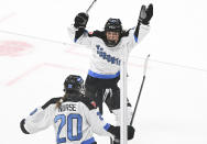 Toronto's Sarah Nurse (20) celebrates with teammate Emma Maltais (27) after scoring against Montreal during the overtime period of a PWHL hockey game at the Bell Centre in Montreal, Saturday, April 20, 2024.(Graham Hughes/The Canadian Press via AP)