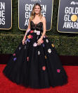 <p>Flower Power: Auf dem roten Teppich der Golden Globes im Jahr 2019 blühte Heidi in einem Ballkleid mit floralen Elementen und transparenter Korsage auf.</p> 