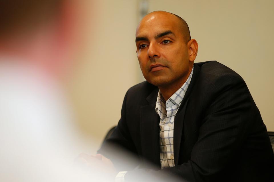 Massachusetts Veterans Services Secretary Jon Santiago during a visit to the Veterans Transition House in New Bedford.