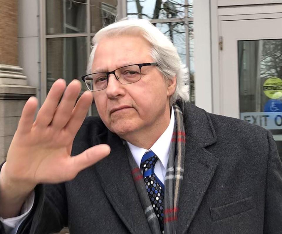 Dr. Joseph M. Thomas, the owner of Tri-State Pain Institute, leaves the federal courthouse in Erie in 2020 after a bankruptcy proceeding.