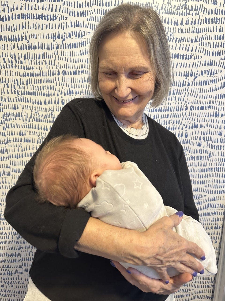 Andrea Chancellor and her new grandson.
