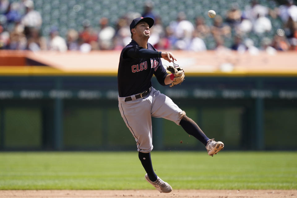 Cleveland Guardians third baseman Tyler Freeman throws out Detroit Tigers' Tucker Barnhart at first during the third inning of a baseball game, Thursday, Aug. 11, 2022, in Detroit. (AP Photo/Carlos Osorio)