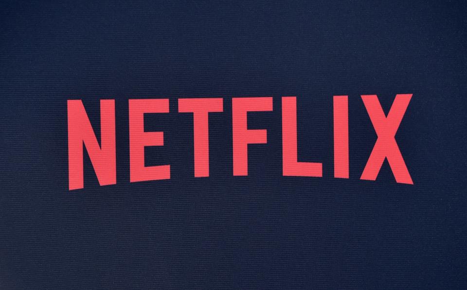 Netflix logo seen on the backdrop of Netflix's "Stranger Things 3" premiere at Santa Monica high school Barnum Hall on June 28, 2019 in Santa Monica, California. (Photo by Chris Delmas / AFP)        (Photo credit should read CHRIS DELMAS/AFP/Getty Images)