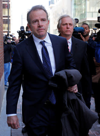 Gordon Ernst, Georgetown University's former head tennis coach facing charges in a nationwide college admissions cheating scheme, leaves the federal courthouse in Boston, Massachusetts, U.S., March 25, 2019. REUTERS/Brian Snyder