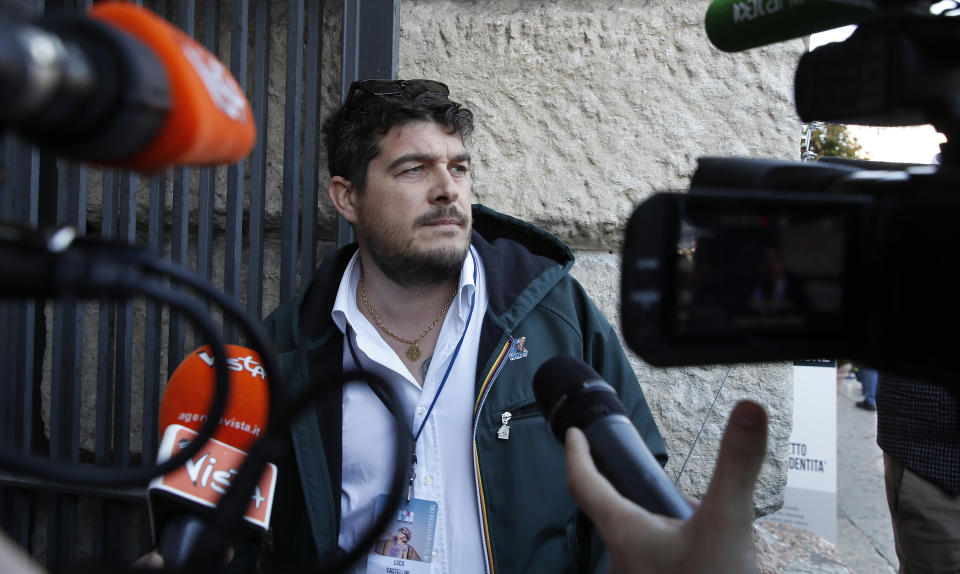 Neo-fascist Forza Nuova party's Luca Castellini arrives at the World Congress of Families, in Verona, Italy, Saturday, March 30, 2019. A congress in Italy under the auspices of a U.S. organization that defines family as strictly centering around a mother and father has made Verona — the city of Romeo and Juliet — the backdrop for a culture clash over family values, with a coalition of civic groups mobilizing against what they see as a counter-reform movement to limit LGBT and women's rights. (AP Photo/Antonio Calanni)
