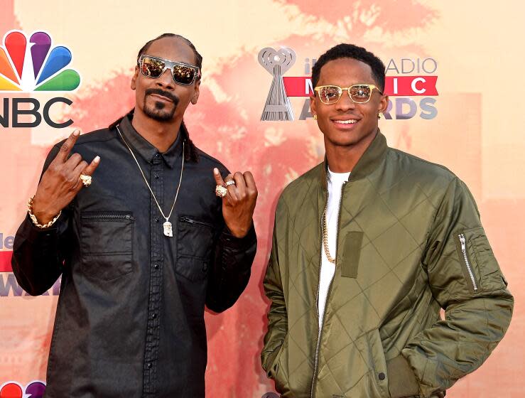 Recording artist Snoop Dogg and son Cordell Broadus