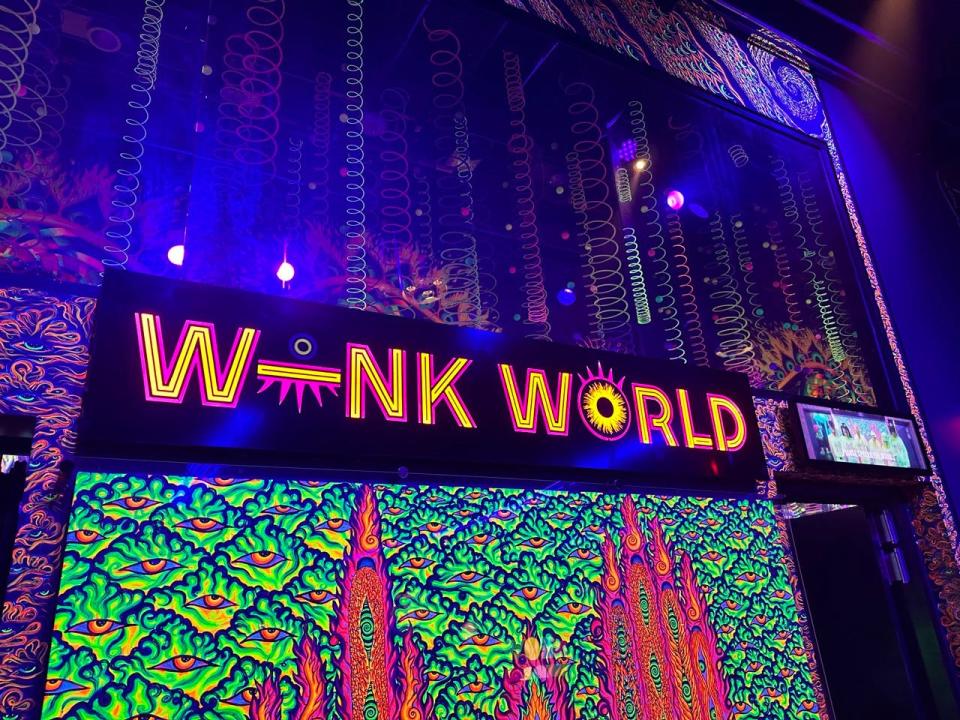 Neon-lit Wink World sign in Las Vegas