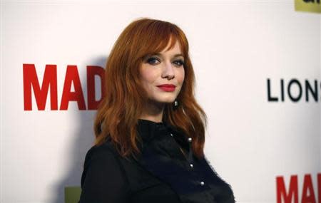 Cast member Christina Hendricks poses at the premiere for the seventh season of the television series "Mad Men" in Los Angeles, California April 2, 2014. REUTERS/Mario Anzuoni