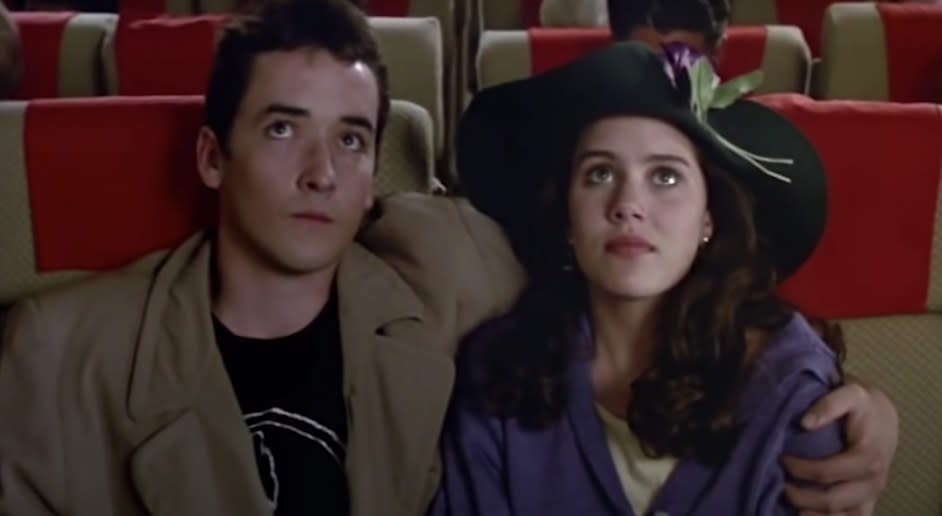 John Cusack with his arm around Ione Skye in a scene from "Say Anything"