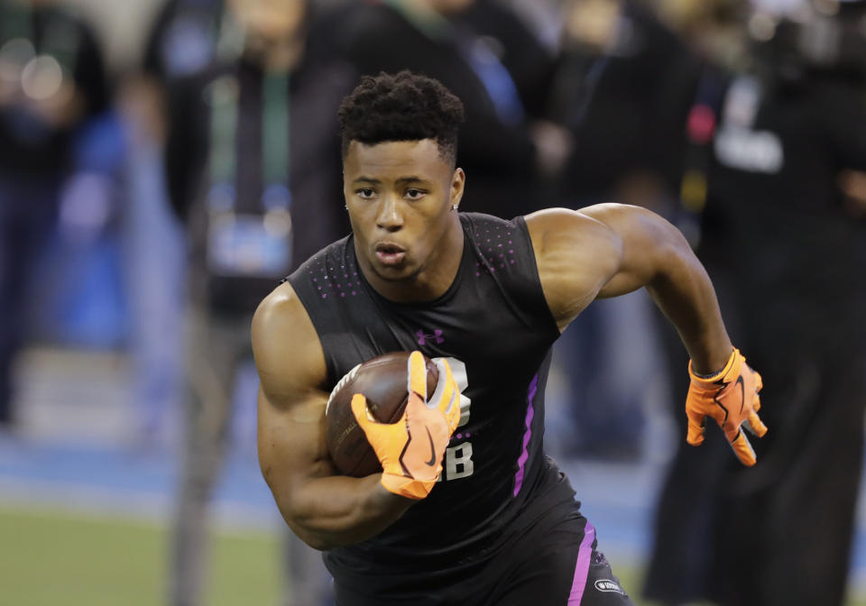 Penn State running back Saquon Barkley runs a drill during the NFL football scouting combine. (AP Photo/Darron Cummings)