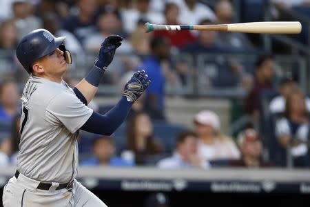 Jun 19, 2018; Bronx, NY, USA; Seattle Mariners first baseman Ryon Healy (27) throws his bat as he flies out against the New York Yankees during the fifth inning at Yankee Stadium. Mandatory Credit: Adam Hunger-USA TODAY Sports