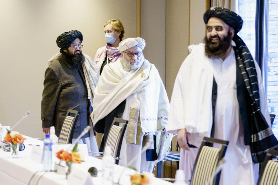 Representatives of the Taliban Sakhaullah Sayed, Mutiul Haq Nabi Kheel and Amir Khan Muttaqi during the meeting between Norwegian humanitarian organizations and representatives of the Taliban at the Soria Moria hotel in Oslo, Tuesday, Jan. 25, 2022. The last day of talks between the Taliban and western diplomats began in Oslo with a bilateral meeting with Norwegian government officials focused largely on the humanitarian situation in Afghanistan. The three-day talks opened on Sunday with talks between the Taliban and members of Afghan civil society, followed on Monday by multilateral talks with western diplomats, the EU, the U.S., Britain, France, Italy and hosts Norway. (Stian Lysberg Solum/NTB via AP)