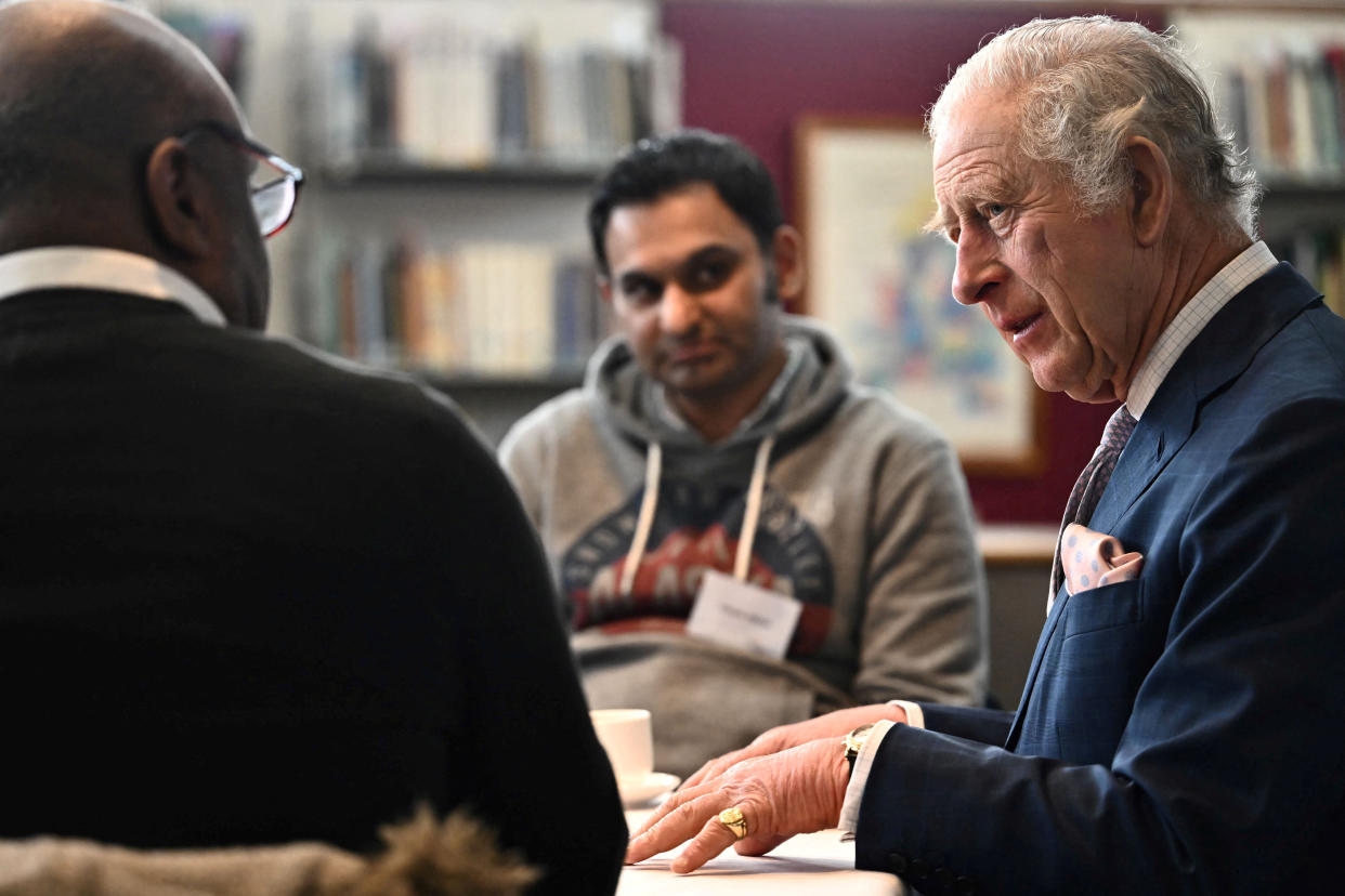 Britain's King Charles III meets with volunteers and service users of the charity organisation Age UK. (Reuters)