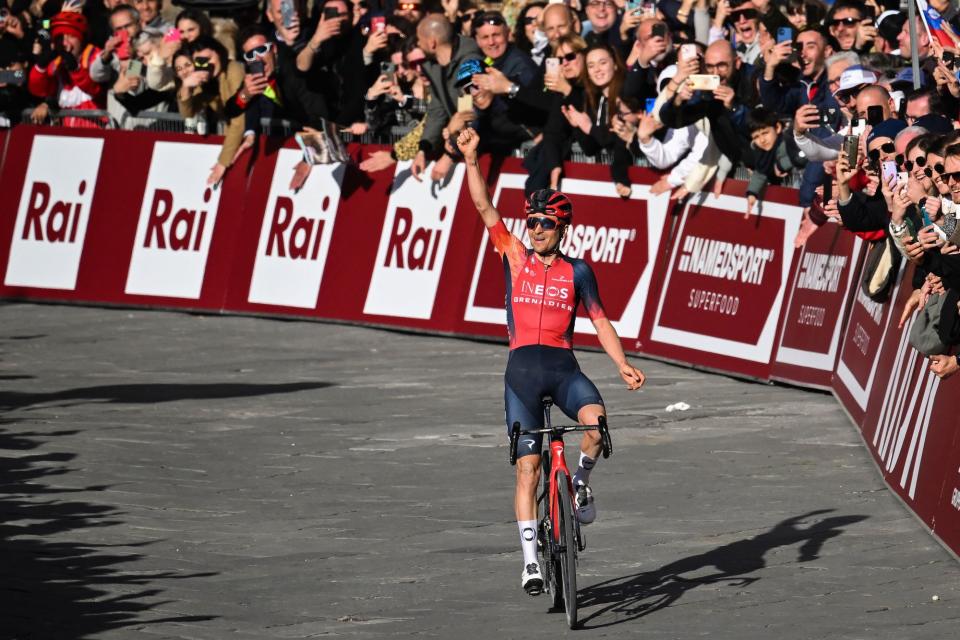 Tom Pidcock celebrates winning Strade Bianche