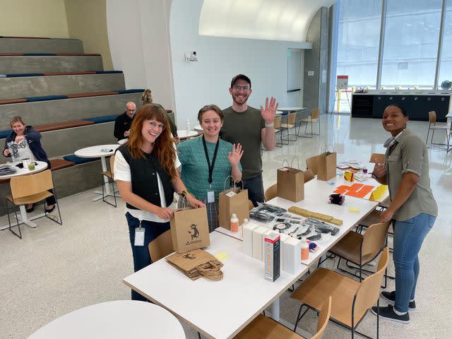 <p>Asana</p> Members of Asana's Team Rainbow and Blacsana ERGs assemble Curly Hair Kits, curated by San Francisco's Larkin Street Youth Services, to address the needs of Black and Brown youth in housing transition.