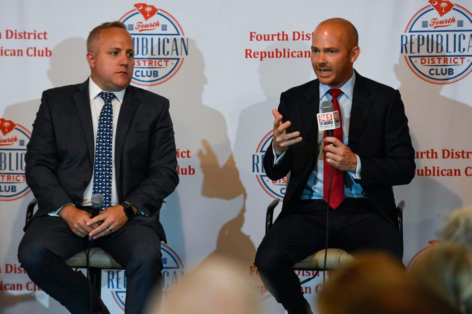 South Carolina Congressmen Russell Fry, left, and William Timmons, answer questions during Washington Night hosted by Fourth District Republican Club at Historic Greer Depot in Greer, S.C., on Wednesday, Aug. 10, 2023.