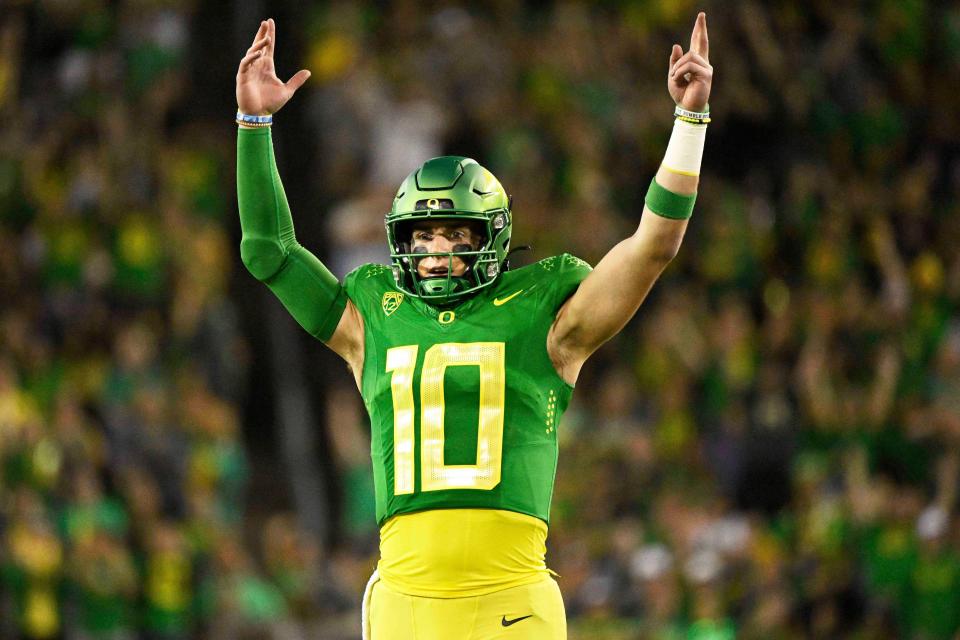 Oregon Ducks quarterback Bo Nix (10) celebrates a touchdown reception during the first half against the Stanford Cardinal at Autzen Stadium Oct. 1, 2022, in Eugene.