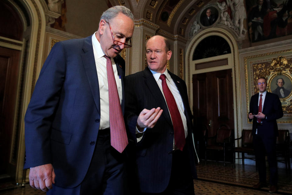 U.S. Senate Minority Leader Chuck Schumer (D-N.Y.) and Sen. Chris Coons (D-Del.) walk together prior to the resumption of the Senate impeachment trial of U.S. President Donald Trump at the U.S. Capitol in Washington, U.S., Jan. 31, 2020. (Photo: Brendan McDermid / Reuters)