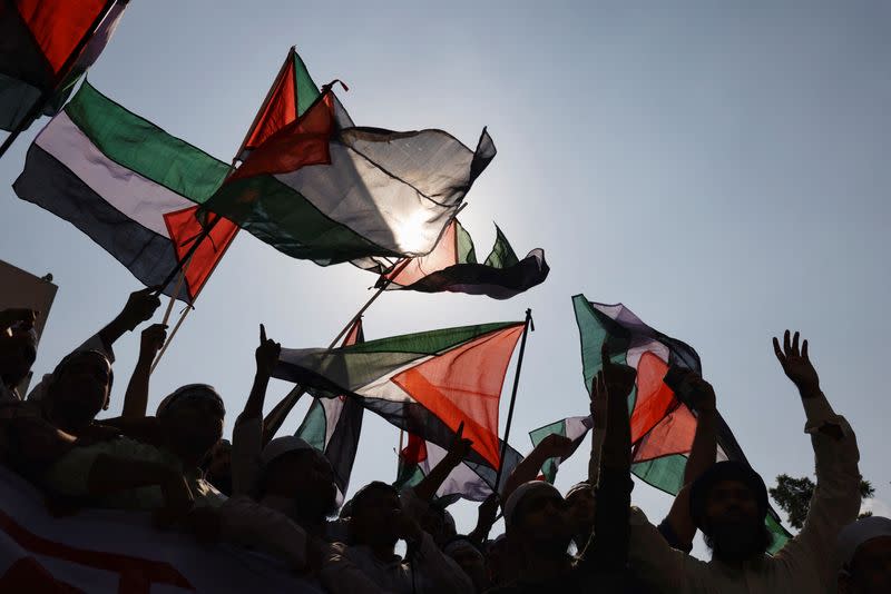 Bangladeshi Muslim activists protest against Israel's actions against Palestinians after Friday prayer at the Baitul Mukarram National Mosque in Dhaka