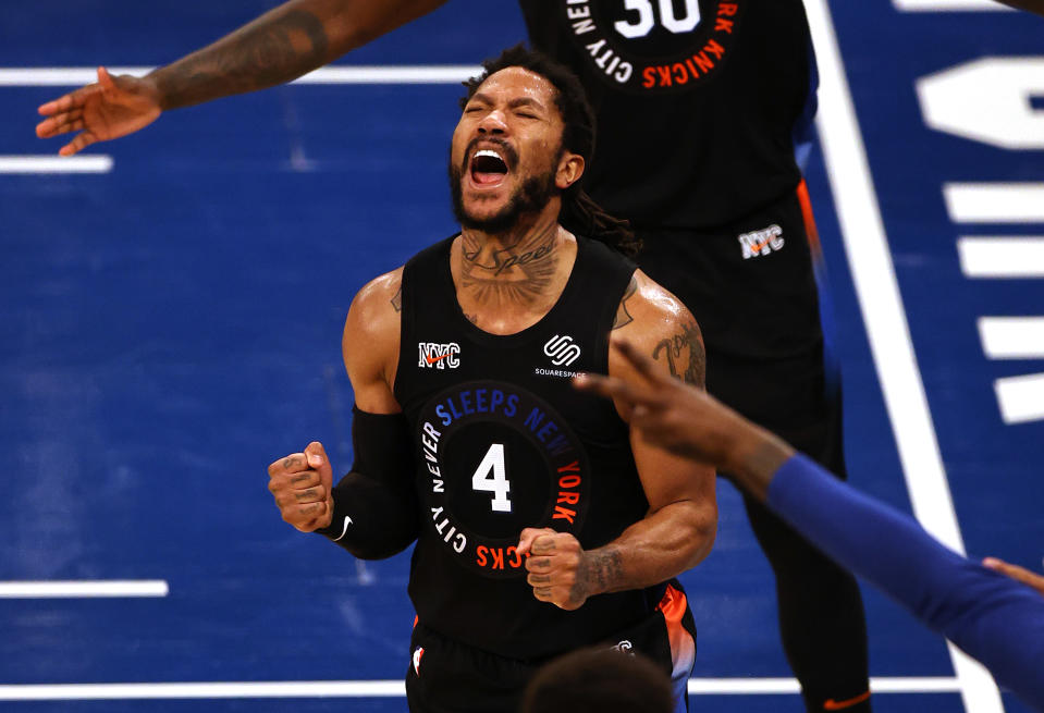 Derrick Rose #4 of the New York Knicks celebrates late in the fourth quarter against the Atlanta Hawks during game two of the Eastern Conference Quarterfinals at Madison Square Garden on May 26, 2021 in New York City.The New York Knicks defeated the  Atlanta Hawks 101-92. NOTE TO USER: User expressly acknowledges and agrees that, by downloading and or using this photograph, User is consenting to the terms and conditions of the Getty Images License Agreement. (Photo by Elsa/Getty Images)