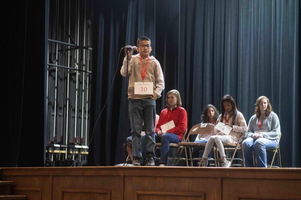 Third-place finisher Irvin Rosales of Booker Junior High School waits on the announcer Saturday at the 2023 Regional Spelling Bee at Tascosa High School in Amarillo.
