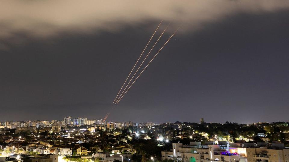 An anti-missile system operates after Iran launched drones and missiles toward Israel, as seen from Ashkelon, Israel April 14, 2024. REUTERS/Amir Cohen  (Amir Cohen/Reuters)