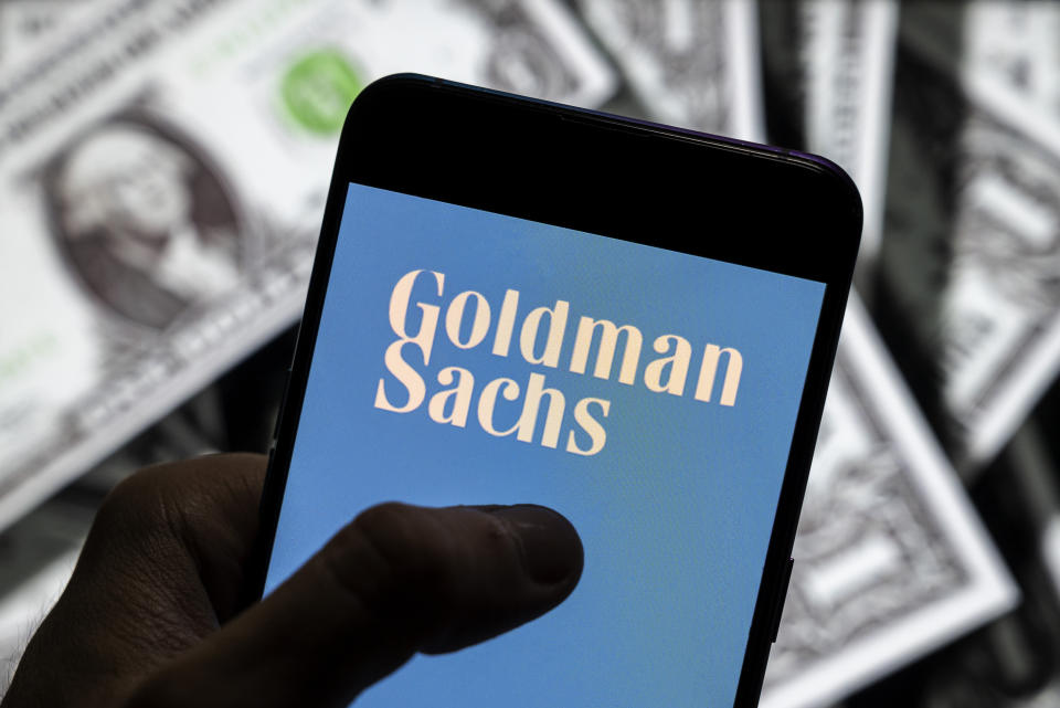 CHINA - 2021/04/23: In this photo illustration the Goldman Sachs logo seen on an Android mobile device screen with the currency of the United States in the background. (Photo Illustration by Budrul Chukrut/SOPA Images/LightRocket via Getty Images)