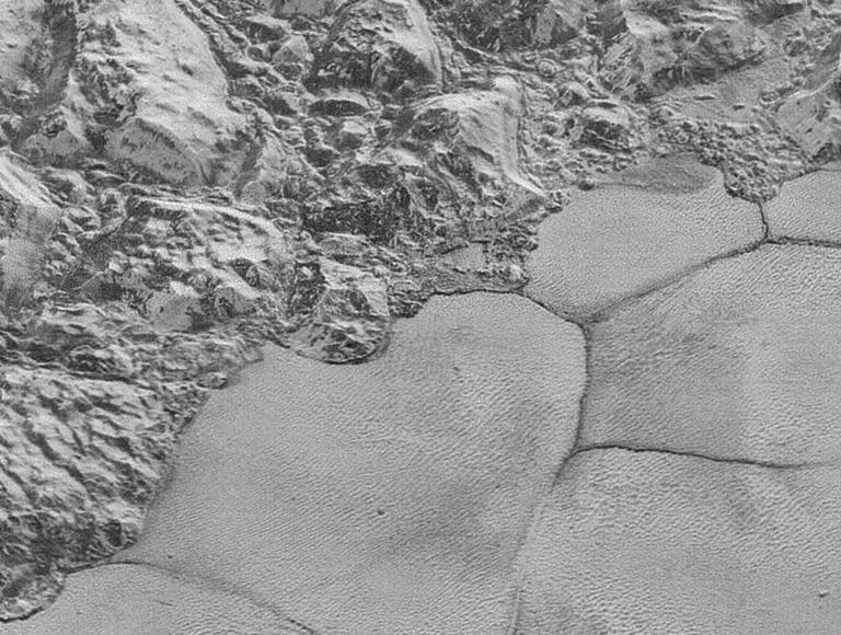 Solid methane dunes discovered at bottom of major mountain range on Pluto