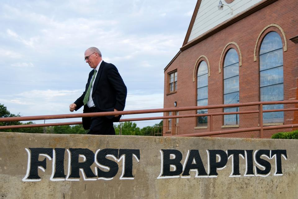 Pastor Bart Barber walks to his church office at the First Baptist Church of Farmersville, Texas, before worship on Sunday, Sept. 25, 2022. Barber said he ran for Southern Baptist Convention president because he prayed and concluded God was calling him to do it, not because of the sex abuse crisis. (AP Photo/Audrey Jackson)