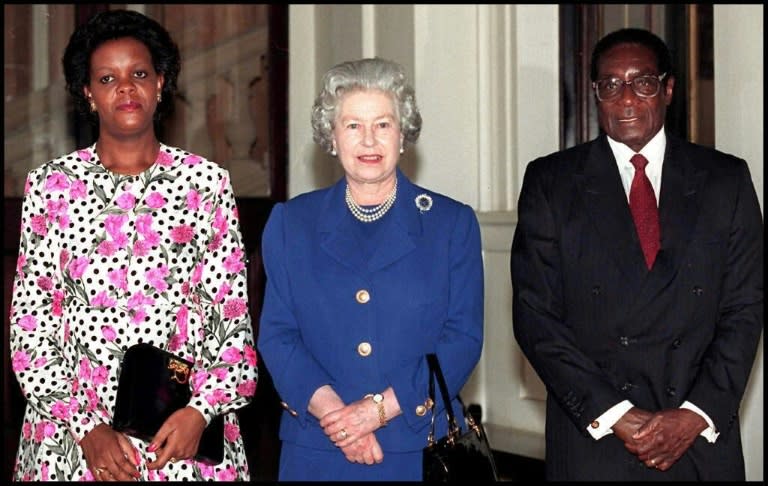 Britain's Queen Elizabeth II met Robert Mugabe and his wife Grace at Buckingham Palace in 1997