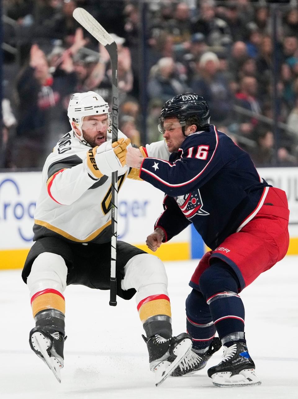 Sun., Mar. 13, 2022; Columbus, Ohio, USA; Columbus Blue Jackets center Max Domi (16) throws down Vegas Golden Knights defenseman Alex Pietrangelo (7) during a fight in the first period of a NHL game between the Columbus Blue Jackets and the Vegas Golden Knights at Nationwide Arena. 