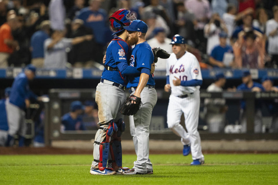 Chicago Cubs catcher Victor Caratini (7) hugs Chicago Cubs pitcher Craig Kimbrel (24) after the last out in the ninth inning against the New York Mets at Citi Field. (USA Today)