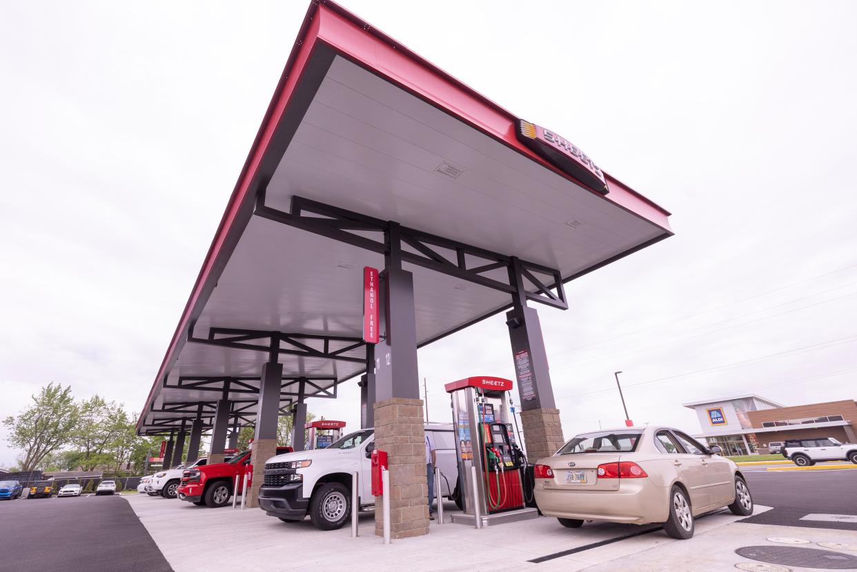 Multiple vehicles were filled with gasoline Thursday morning at the new Sheetz store and fueling center in southern Perry Township near the Massillon Menard's.