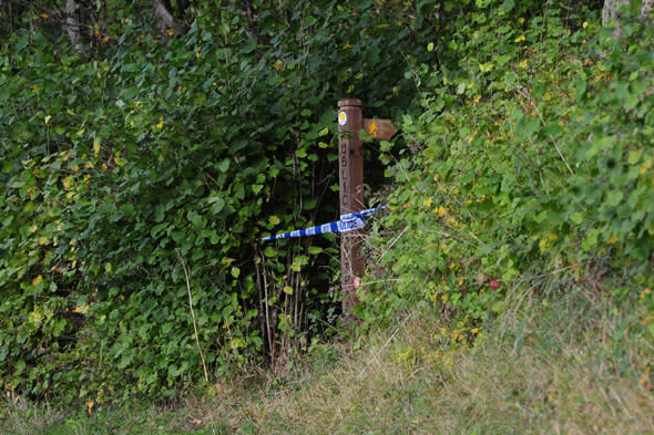 Police tape at the scene at Sweeney mountain near Oswestry in Shropshire, as they investigate the discovery of bones in the location.