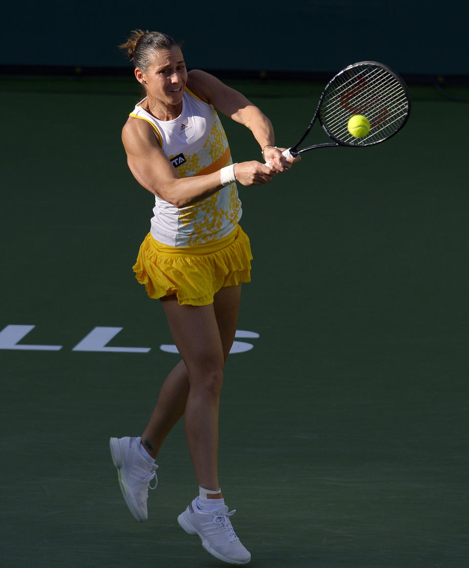 Flavia Pennetta, of Italy, hits to Sloane Stephens, of the United States, during a quarterfinal at the BNP Paribas Open tennis tournament, Thursday, March 13, 2014 in Indian Wells, Calif. (AP Photo/Mark J. Terrill)