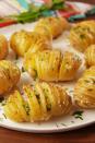 <p>Hasselback it up into these potatoes.</p><p>Get the recipe from <a href="https://www.delish.com/cooking/recipe-ideas/recipes/a55051/garlic-butter-potatoes-recipe/" rel="nofollow noopener" target="_blank" data-ylk="slk:Delish;elm:context_link;itc:0;sec:content-canvas" class="link ">Delish</a>.</p>