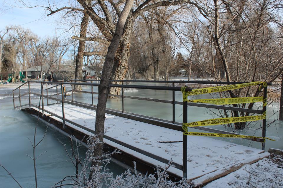 A footbridge designed to cross Spring Creek now leads into it.