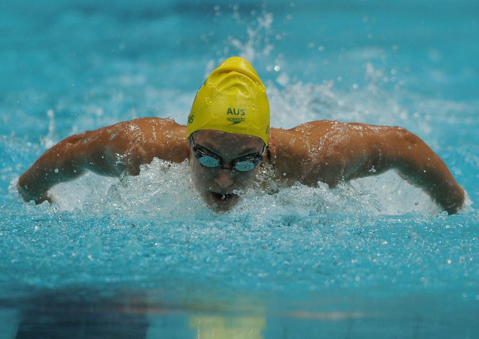 Blair Evans competes during a heat for the women's 400m individual medley event for The Commonwealth Games at the S.P. Mukherjee Aquatics Centre in New Delhi on Oct. 9, 2010. (INDRANIL MUKHERJEE/AFP/Getty Images)