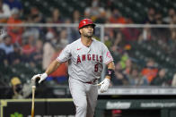 Los Angeles Angels' Albert Pujols watches his two-run home run against the Houston Astros during the sixth inning of a baseball game Thursday, April 22, 2021, in Houston. (AP Photo/David J. Phillip)