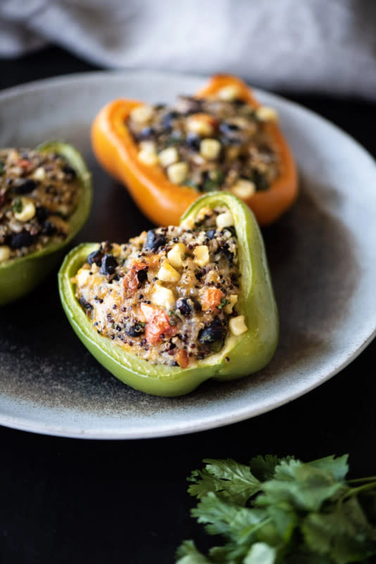 <p>Dude That Cookz</p><p>If you love Southwestern dishes, these Quinoa Stuffed Bell Peppers are an awesome choice. Not only is this dish packed with flavor, but it is also packed with tons of tasty ingredients like sweet corn, black beans, cheese, and pico de gallo.</p><p><strong>Get the recipe: <a href="https://dudethatcookz.com/southwest-quinoa-stuffed-bell-peppers/" rel="nofollow noopener" target="_blank" data-ylk="slk:Southwest Quinoa Stuffed Bell Peppers;elm:context_link;itc:0;sec:content-canvas" class="link ">Southwest Quinoa Stuffed Bell Peppers</a></strong></p>