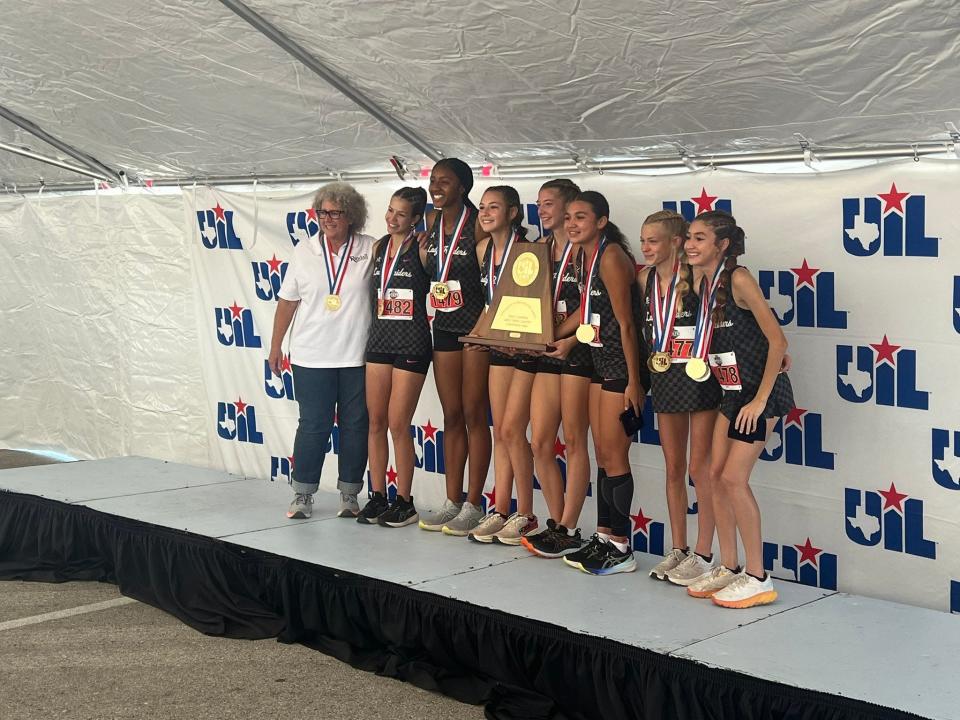 The Randall High School girls cross country team after winning state.